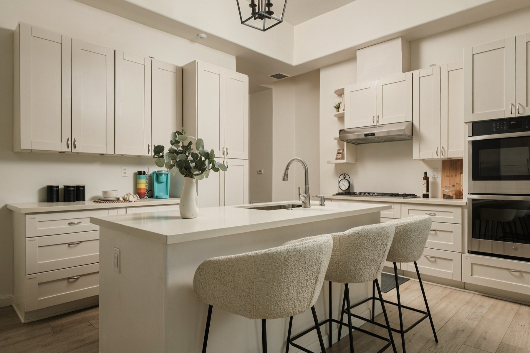 Kitchen island with seating and double ovens