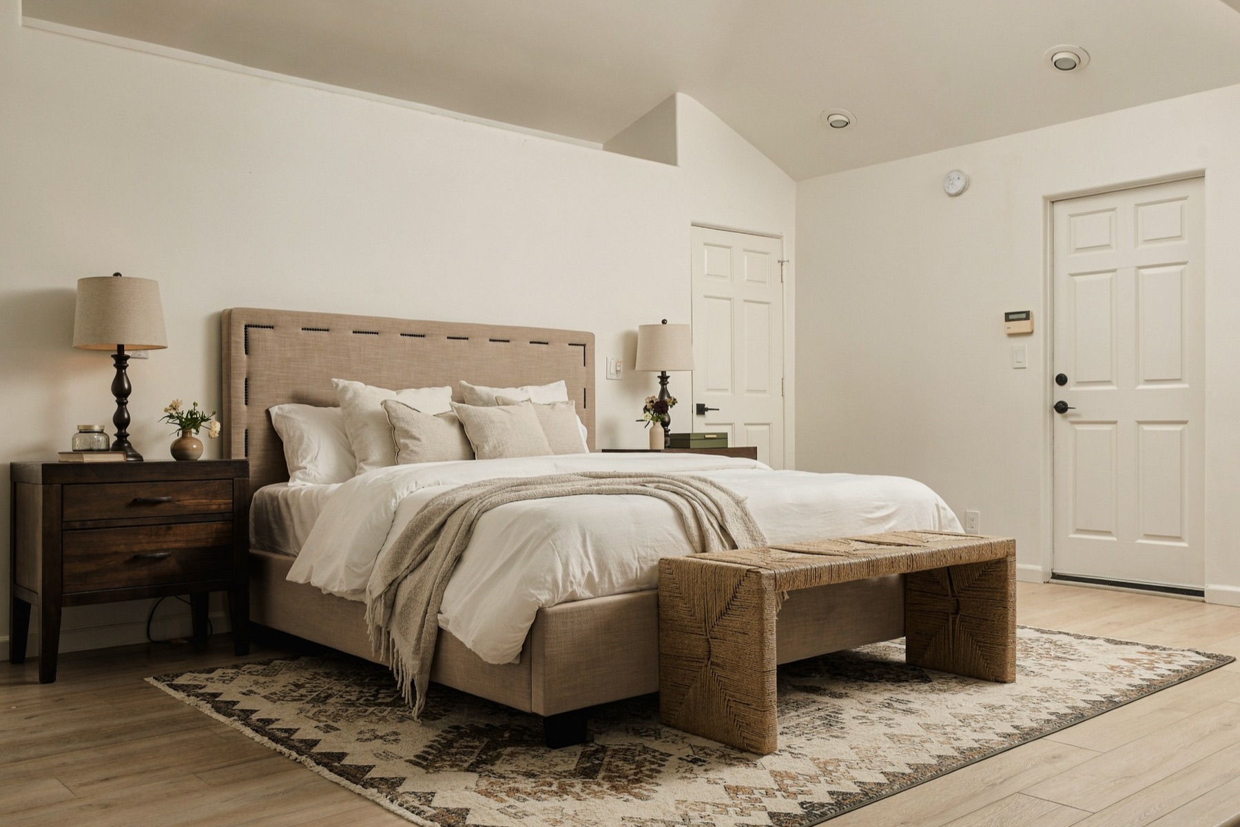 Guest bedroom with an upholstered bed